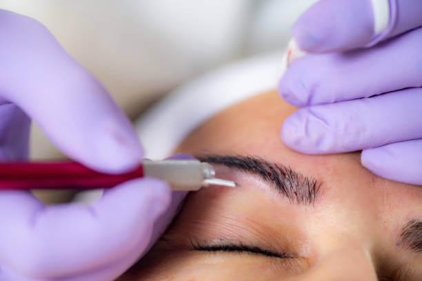 a person getting microblading